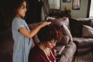 People often ask how I get my girls to sit still while I'm styling their curls. Here are a few quick and easy ways to get your child to enjoy the process.